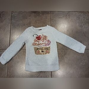 Girls Size Medium Blue Fluffy Miss Cheivous Sweater with Sparkly Cupcake